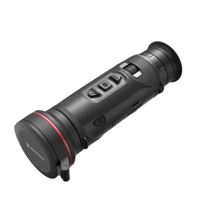 A front-left view of the Hikmicro Falcon FQ50 2.0 thermal monocular with its lens cap securely placed over the objective lens.