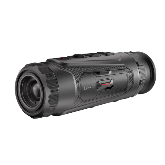 Hikmicro Lynx LH19 3.0 Thermal Monocular, front-left facing view, displaying the manual thermal focus ring on the objective lens, the visible model name, and the rugged textured finish of the housing.