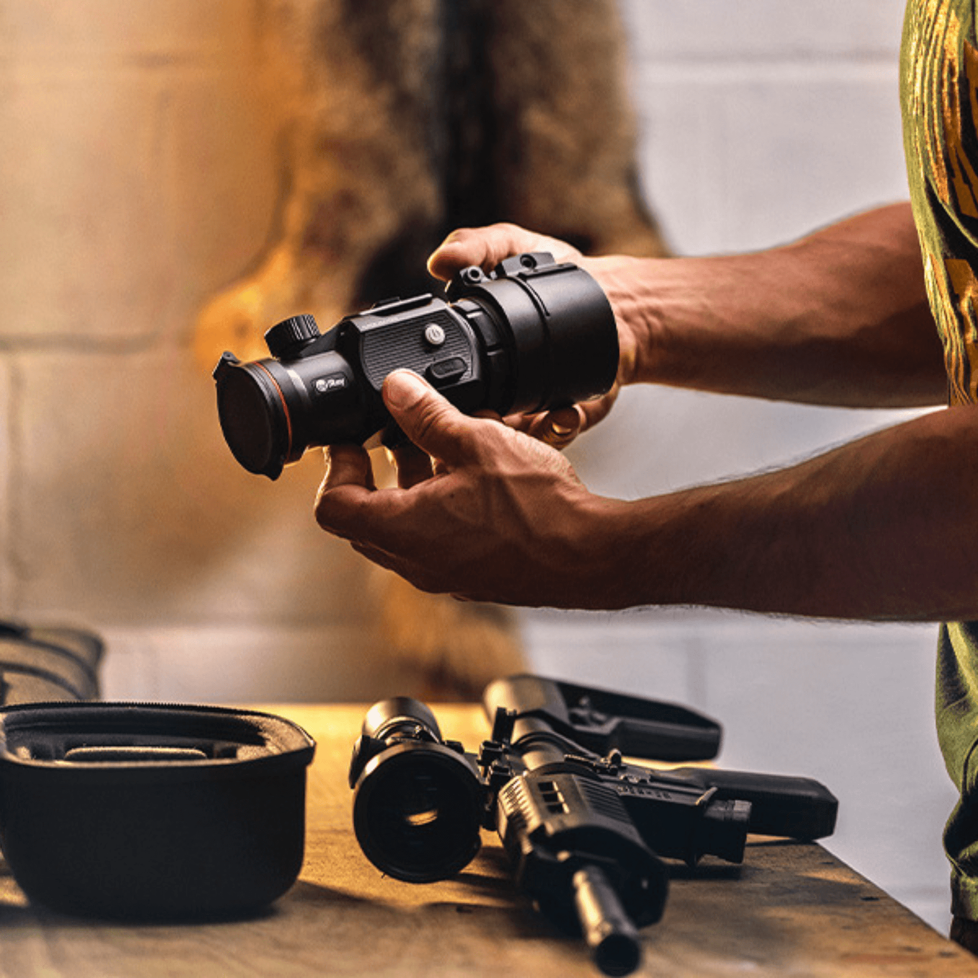  InfiRay MAL38 thermal imaging clip-on attachment, shown being held in a persons hands