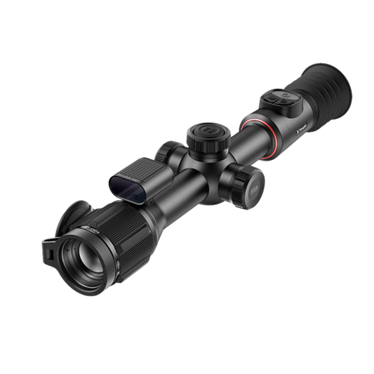 A black Nocpix Bolt L35R thermal riflescope shown from a front-left angle, highlighting the objective lens with its lens cap, the integrated laser rangefinder module, and the turrets on the main tube.
