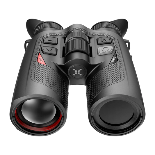 Close-up front view of the Nocpix Quest S50R, highlighting the large 50mm F1.1 germanium thermal lenses and the integrated laser rangefinder (LRF) module located centrally between the tubes.