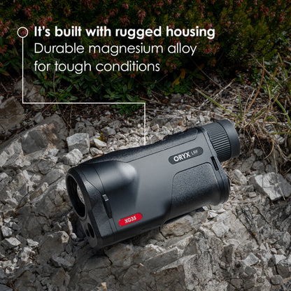 Pulsar Oryx LRF XG35 thermal monocular; compact black handheld device with large objective lens and integrated laser rangefinder. A rugged thermal monocular